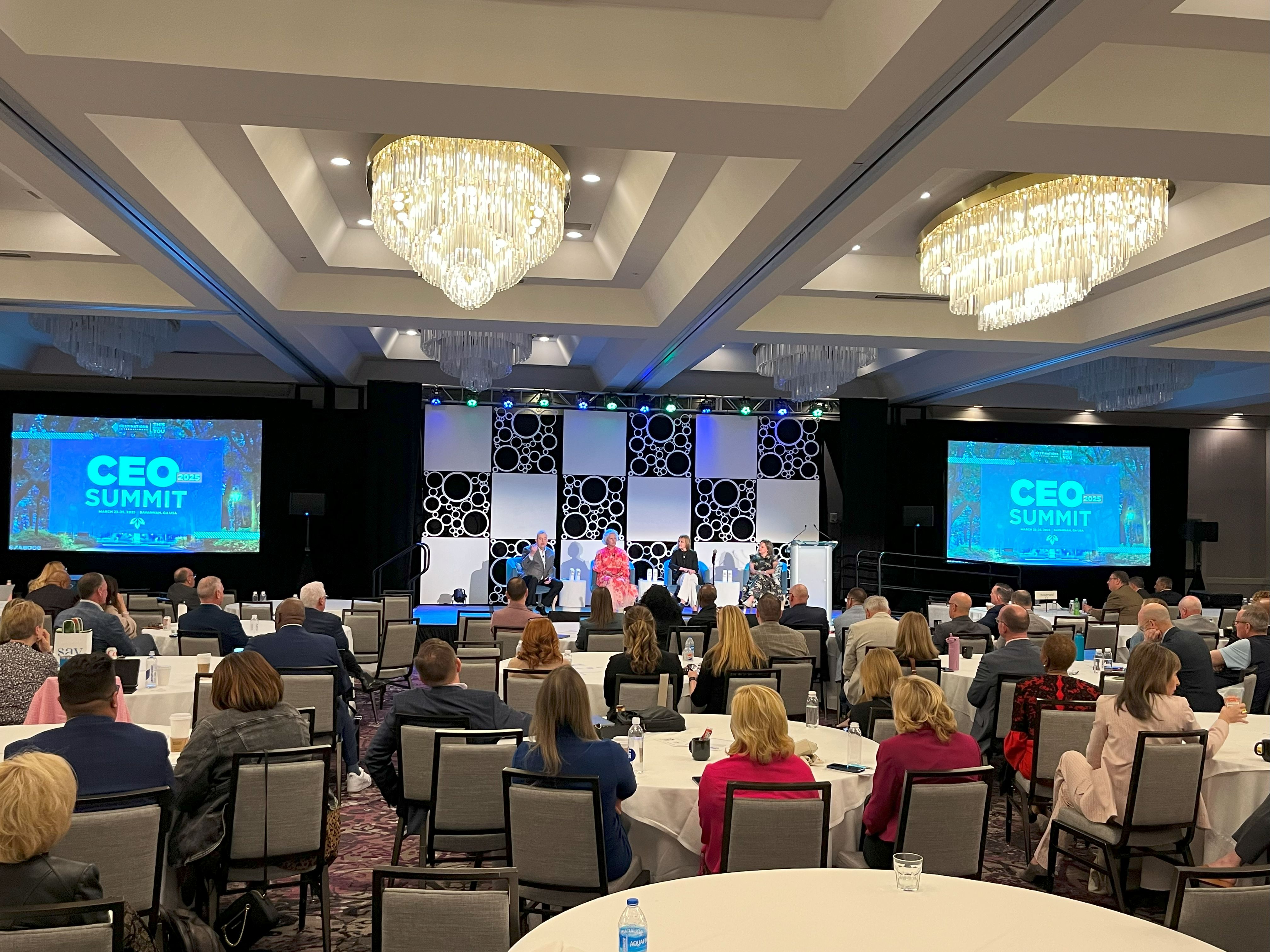 panelists on stage at CEO Summit