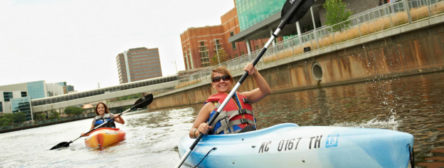 woman kayaking on the river